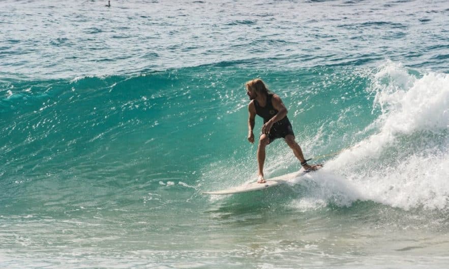 The Guide to Skimboarding vs Surfing Seaside