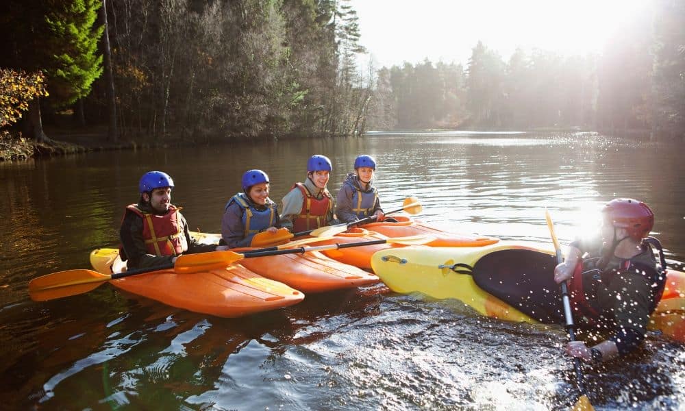 people learning to kayak properly