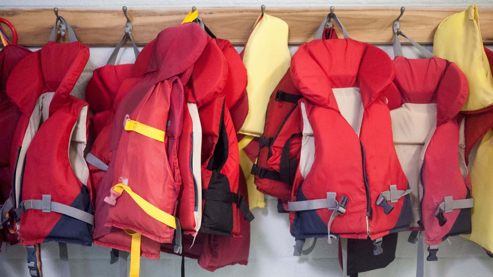 PFDs hanging on the wall