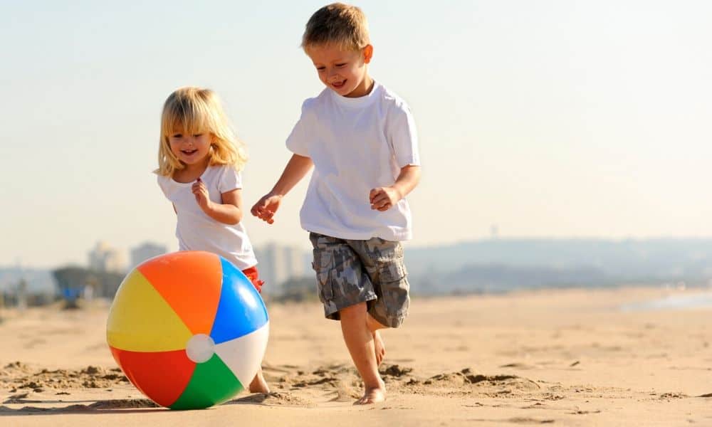 kids playing with a beach ball