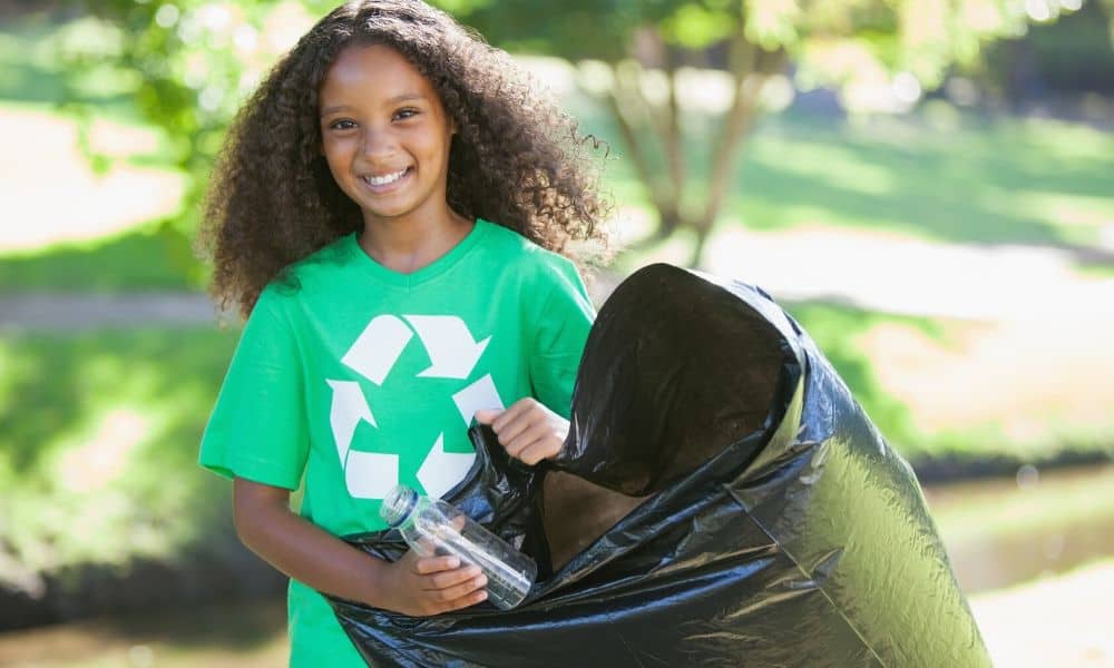 young lady with trashbag