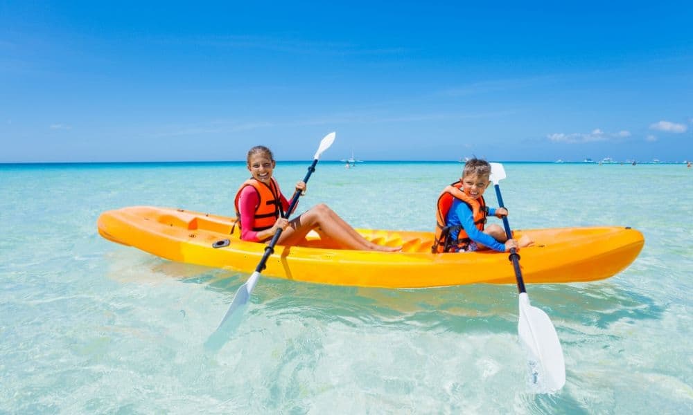 kids paddling a kayak