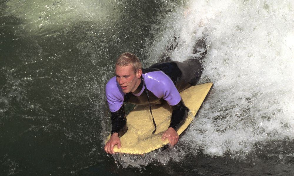 man riding a wave