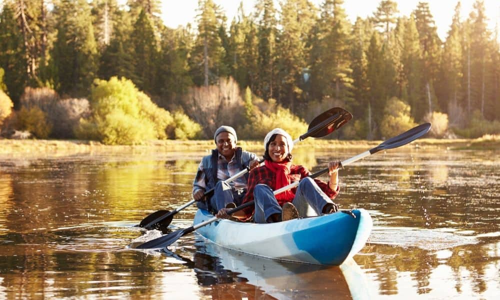 happy couple rowing